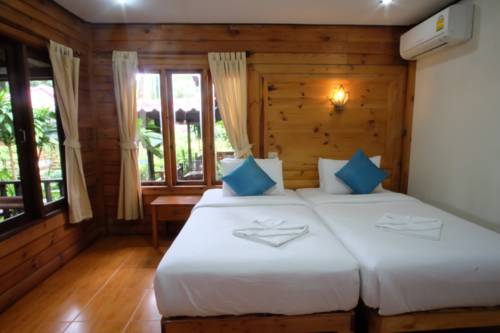 Imagen de la habitación del Hotel Tonsak Resort. Foto 11