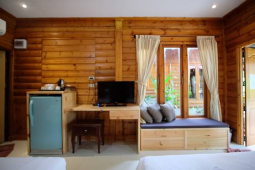 Imagen de la habitación del Hotel Tonsak Resort. Foto 15