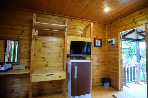 Imagen de la habitación del Hotel Tonsak Resort. Foto 16