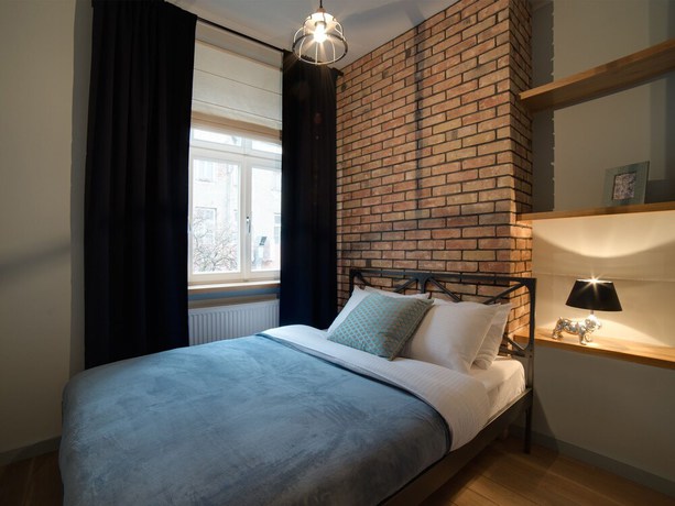 Imagen de la habitación del Hotel Too-good Apartments. Foto 6