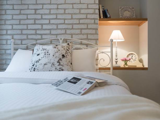 Imagen de la habitación del Hotel Too-good Apartments. Foto 8