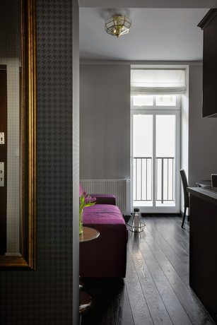 Imagen de la habitación del Hotel Too-good Apartments. Foto 17