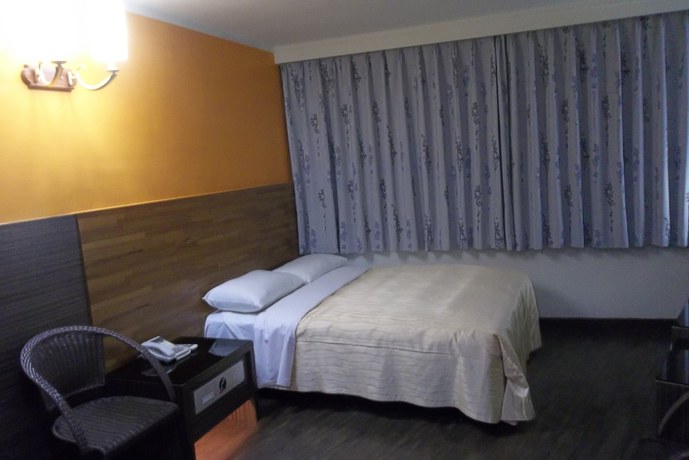 Imagen de la habitación del Hotel Toong Mao Kao Shang Ching. Foto 12