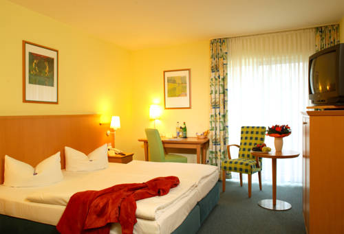 Imagen de la habitación del Hotel Top Atrium Am Meer. Foto 5