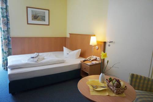 Imagen de la habitación del Hotel Top Atrium Am Meer. Foto 7