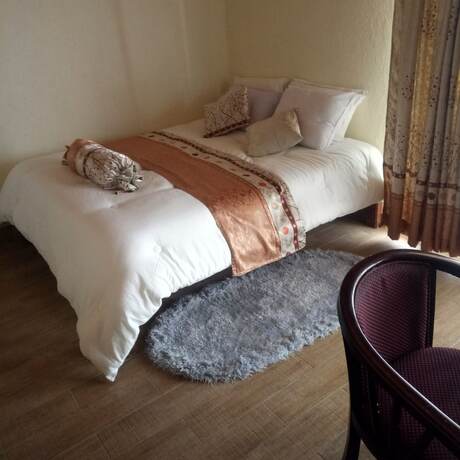 Imagen de la habitación del Hotel Top Cliff. Foto 16