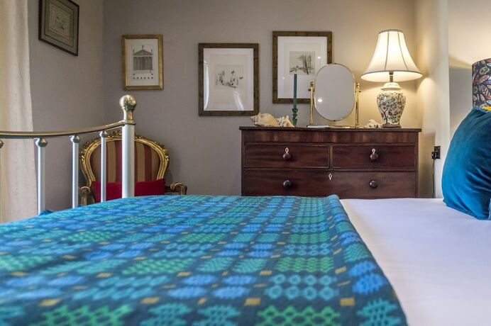 Imagen de la habitación del Hotel Top Joes Townhouse. Foto 12