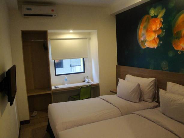 Imagen de la habitación del Hotel Top Manado. Foto 14