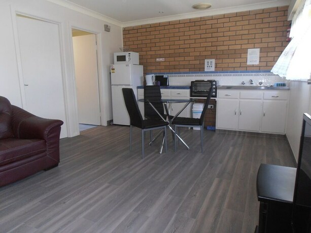 Imagen de la habitación del Hotel Top of the Lake Units. Foto 15