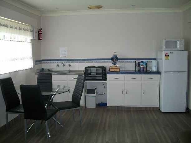Imagen de la habitación del Hotel Top of the Lake Units. Foto 19