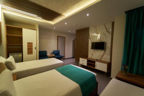 Imagen de la habitación del Hotel Top pyramids hotel. Foto 18