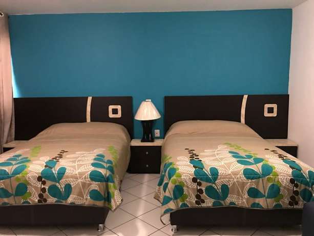 Imagen de la habitación del Hotel Topacio. Foto 7