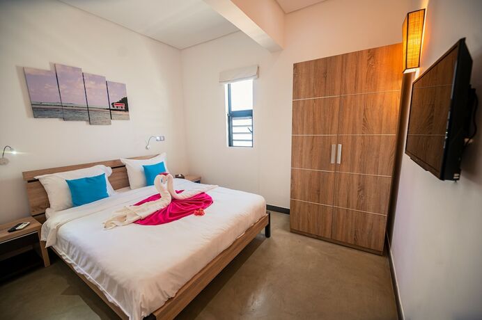 Imagen de la habitación del Hotel Toparadis Guest House. Foto 18