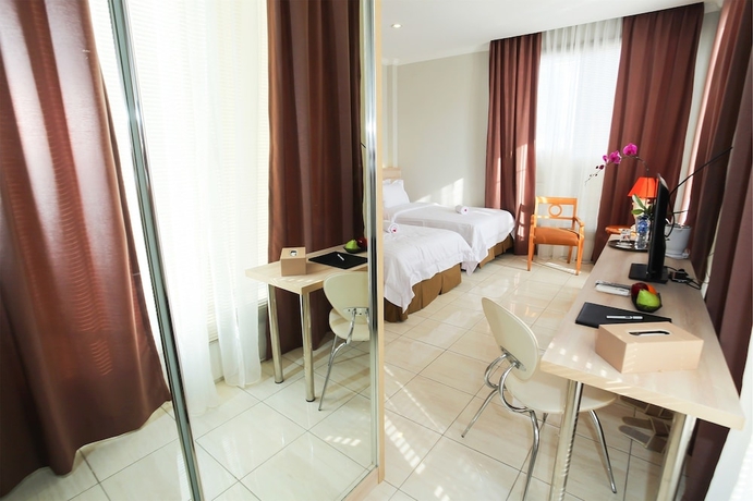 Imagen de la habitación del Hotel Topaz Residence. Foto 14