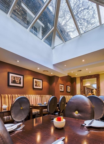 Imagen del bar/restaurante del Hotel Tophams. Foto 4