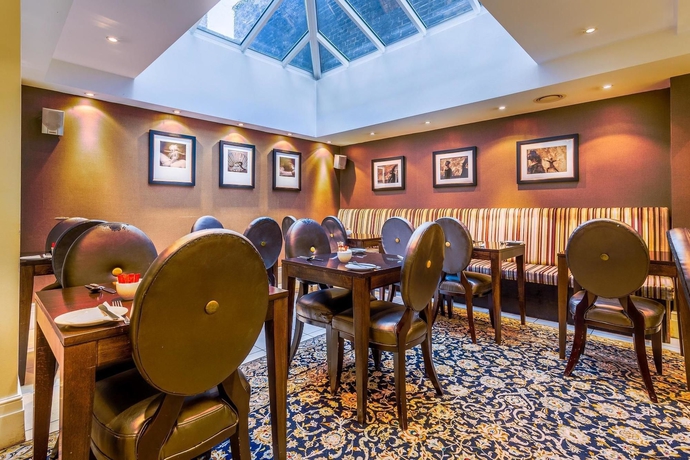 Imagen del bar/restaurante del Hotel Tophams. Foto 5