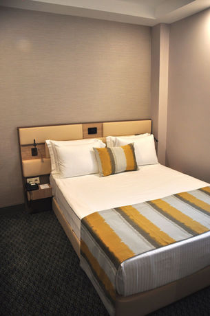 Imagen de la habitación del Hotel Tophane Suites. Foto 8