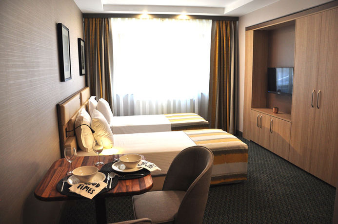 Imagen de la habitación del Hotel Tophane Suites. Foto 9