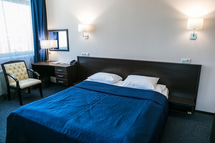 Imagen de la habitación del Hotel Topos Congress-hotel. Foto 18