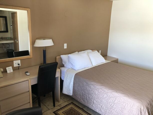 Imagen de la habitación del Hotel Topper Motel. Foto 13