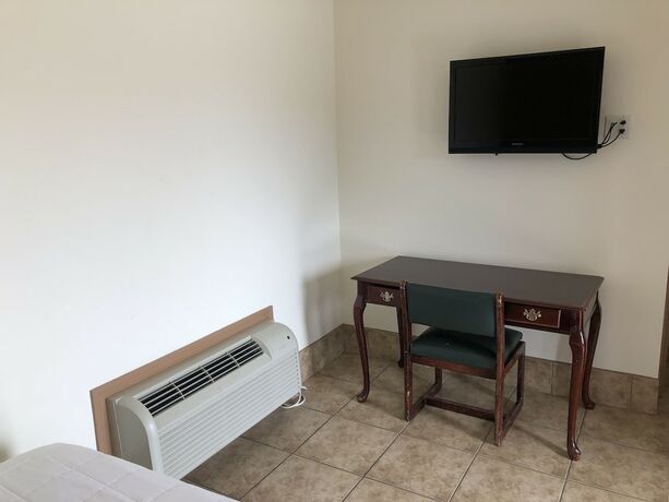 Imagen de la habitación del Hotel Topper Motel. Foto 16