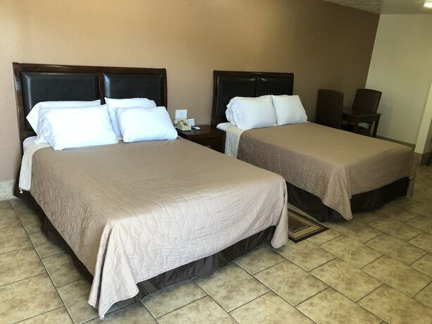 Imagen de la habitación del Hotel Topper Motel. Foto 17