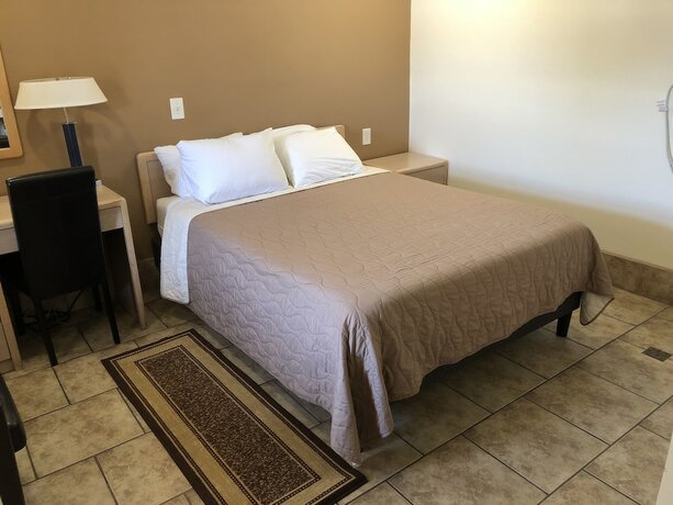 Imagen de la habitación del Hotel Topper Motel. Foto 19