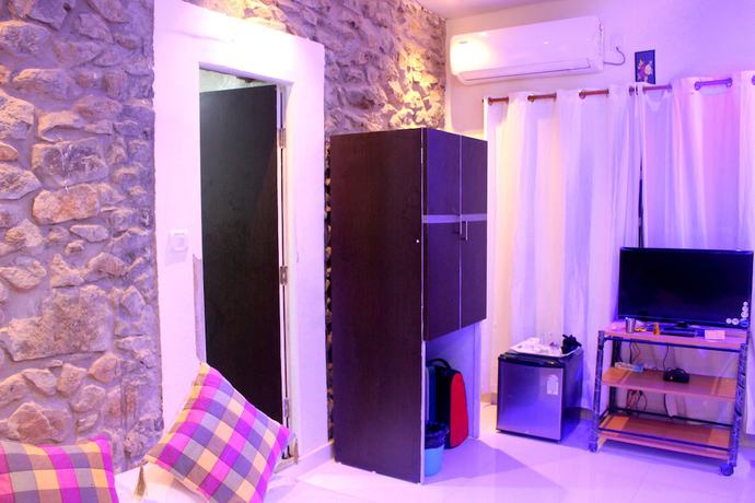 Imagen de la habitación del Hotel Toppers corner-A Boutique Garden Resort. Foto 19