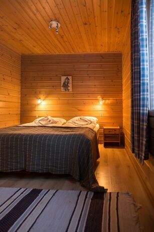 Imagen de la habitación del Hotel Torassieppi Eco Reindeer Resort. Foto 19