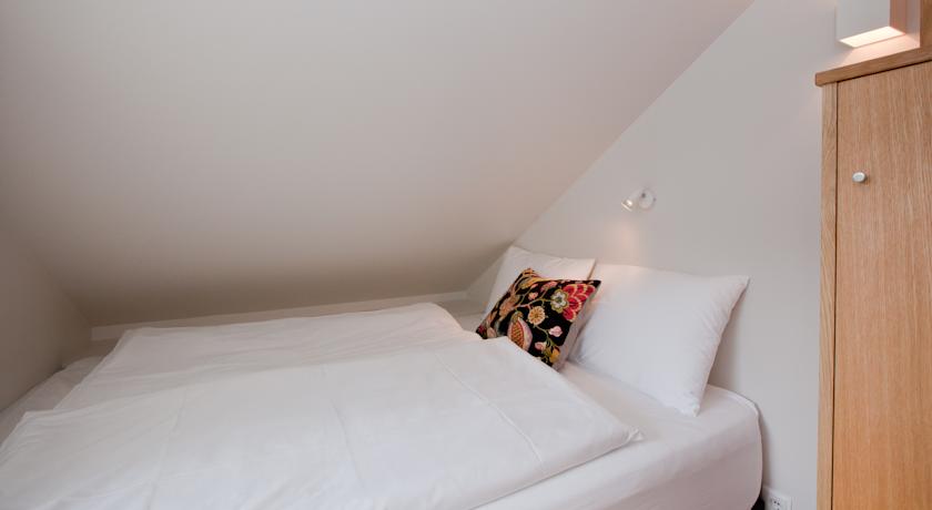 Imagen de la habitación del Hotel Torg Guesthouse. Foto 9