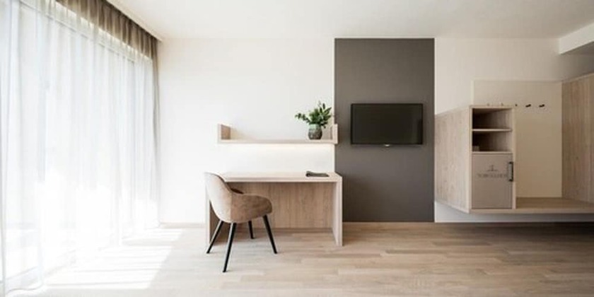 Imagen de la habitación del Hotel Torgglhof Kaltern. Foto 5