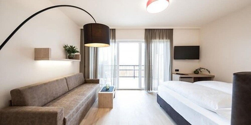 Imagen de la habitación del Hotel Torgglhof Kaltern. Foto 11