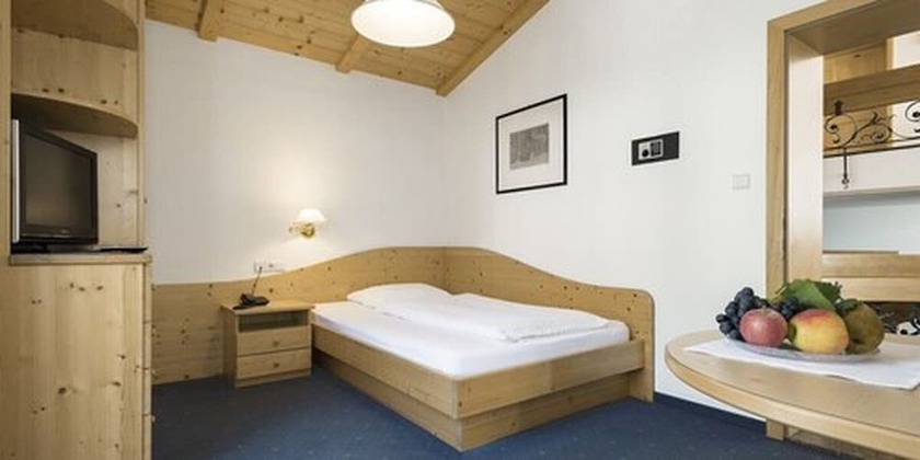 Imagen de la habitación del Hotel Torgglhof Kaltern. Foto 12