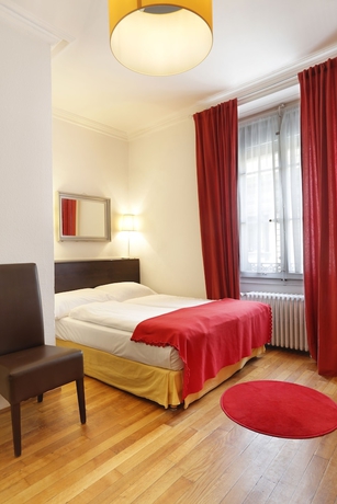 Imagen de la habitación del Hotel Torhôtel Genève. Foto 4