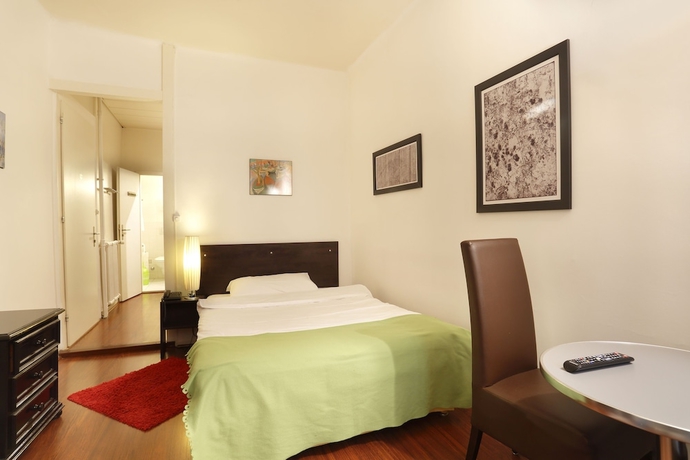 Imagen de la habitación del Hotel Torhôtel Genève. Foto 8