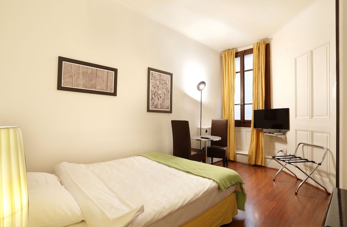 Imagen de la habitación del Hotel Torhôtel Genève. Foto 9