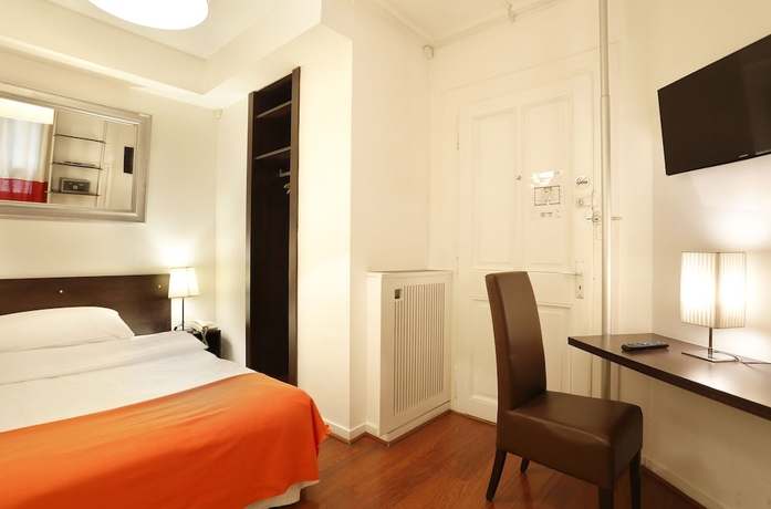 Imagen de la habitación del Hotel Torhôtel Genève. Foto 10