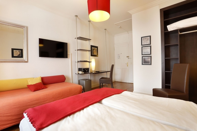 Imagen de la habitación del Hotel Torhôtel Genève. Foto 12