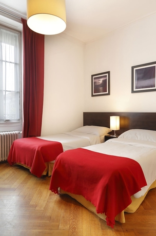 Imagen de la habitación del Hotel Torhôtel Genève. Foto 19