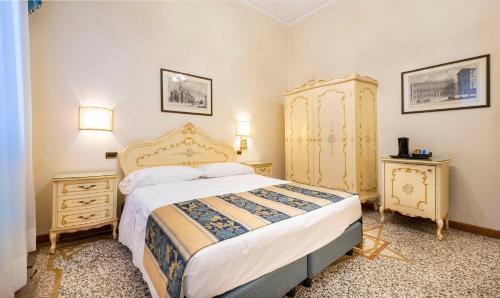 Imagen de la habitación del Hotel Torino, Venecia. Foto 15