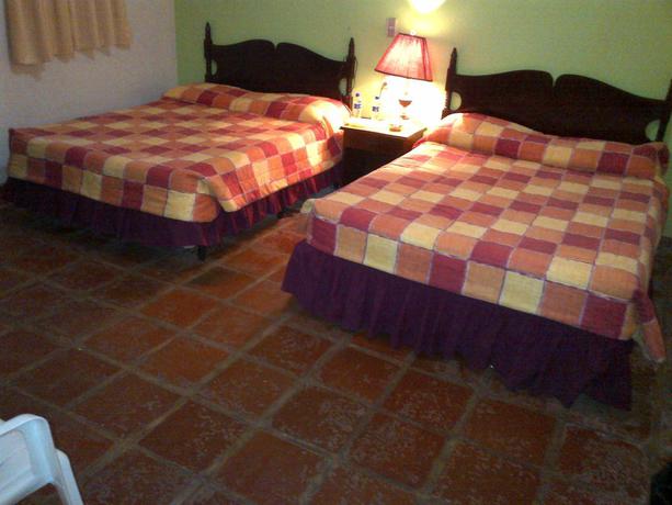 Imagen de la habitación del Hotel Torola and Beach Resort. Foto 5