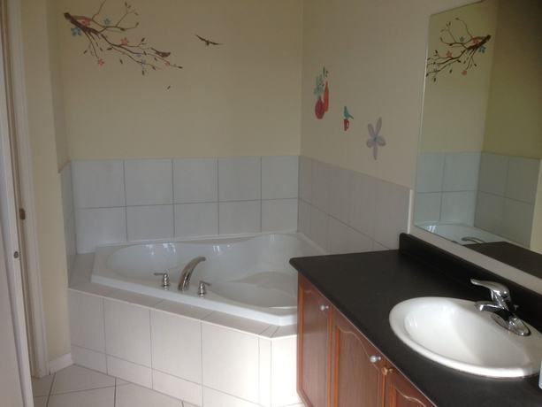 Imagen de la habitación del Hotel Toronto North Travellers Home. Foto 2