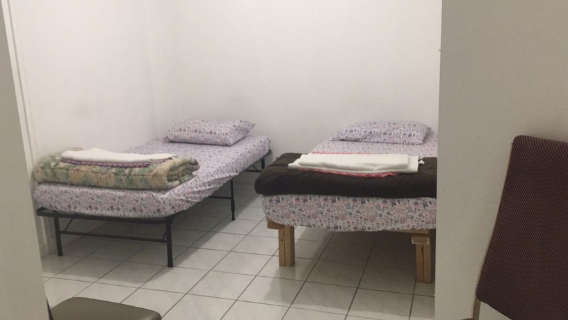 Imagen de la habitación del Hotel Toronto North Travellers Home. Foto 4