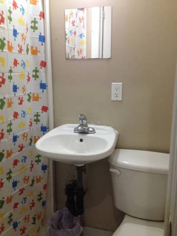 Imagen de la habitación del Hotel Toronto Travellers Home. Foto 4