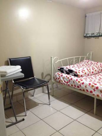 Imagen de la habitación del Hotel Toronto Travellers Home. Foto 10