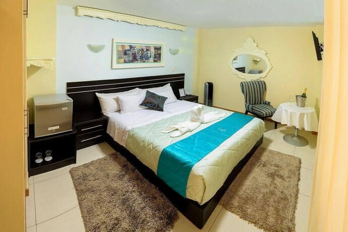 Imagen de la habitación del Hotel Torre Cristal Boutique. Foto 13