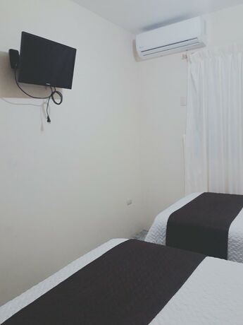 Imagen de la habitación del Hotel Torres del Norte. Foto 17