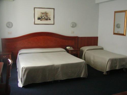 Imagen de la habitación del Hotel Tortorina. Foto 8