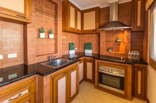 Imagen de la habitación del Hotel Tortuga Villas Pattaya. Foto 12
