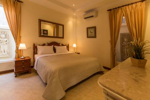 Imagen de la habitación del Hotel Tortuga Villas Pattaya. Foto 14